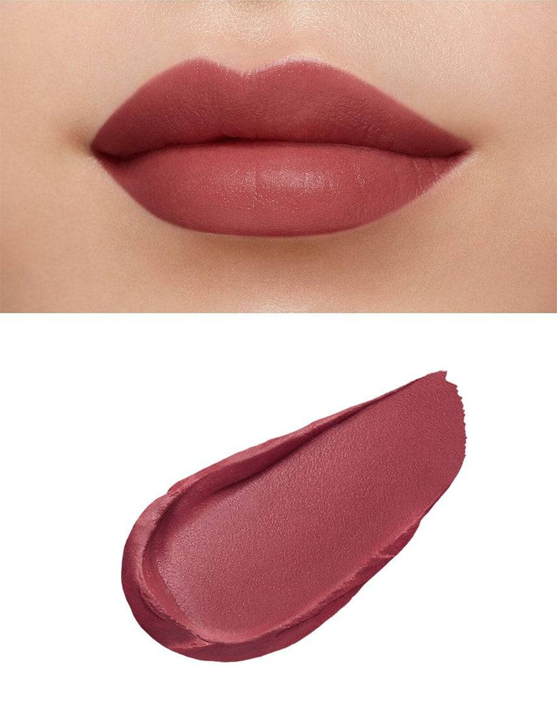 Clé de Peau Beauté Rouge Creme Matte 8g applied on lips, showcasing a smooth, deep matte finish in a rich mauve shade.