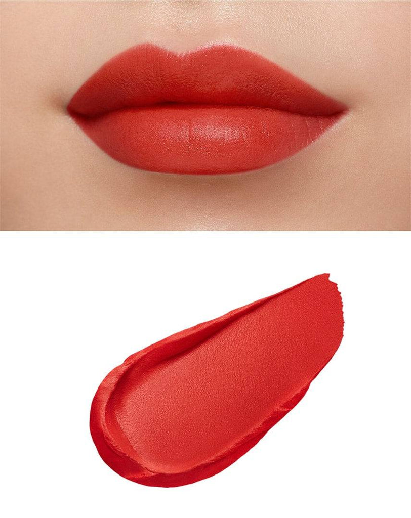 Clé de Peau Beauté Rouge Creme Matte 8g showcased on lips, featuring a vibrant matte red finish for a bold and elegant look.