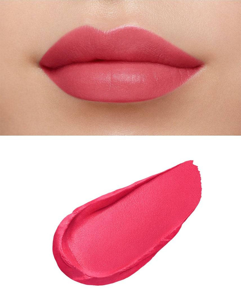 Clé de Peau Beauté Rouge Creme Matte 8g applied on lips, showcasing a vibrant matte pink finish for soft, supple lips.