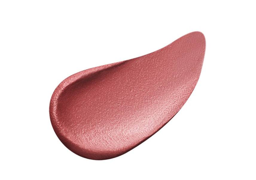 Close-up of Clé de Peau Beauté Rouge Allève Matte lipstick in a delicate rose shade with a smooth matte finish.