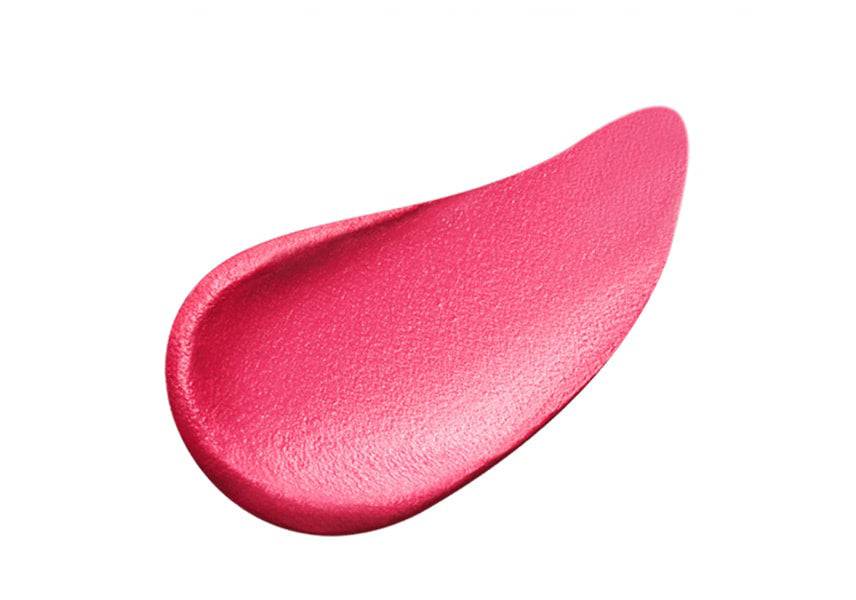 Close-up of Clé de Peau Beauté Rouge Allève Matte lipstick in a vivid magenta shade with a smooth matte finish.