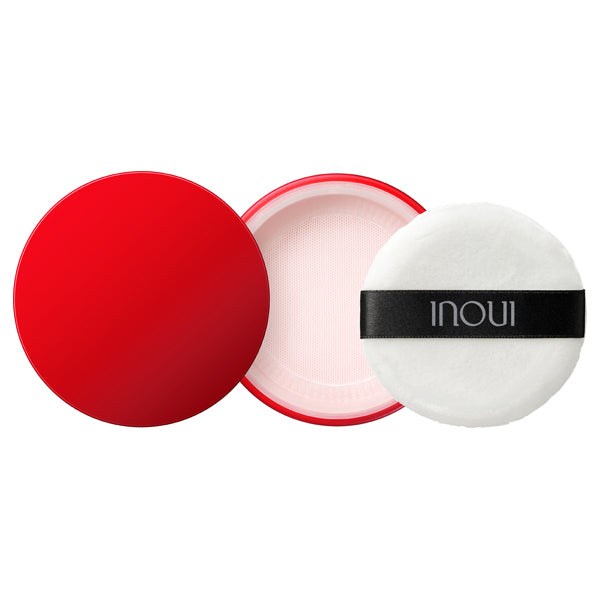 Inoui loose powder compact highlighting a smooth, natural finish for flawless makeup application.