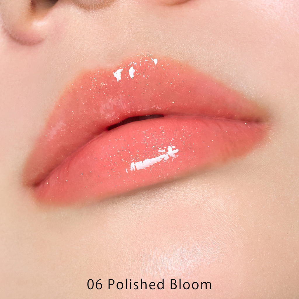 Petal Blooming lip gloss by to/one showcasing vibrant, glossy lips with a smooth, floral-inspired finish