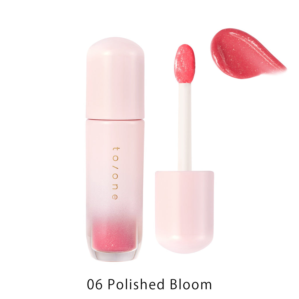 Petal Blooming lip gloss by to/one showcasing vibrant, glossy lips with a smooth, floral-inspired finish