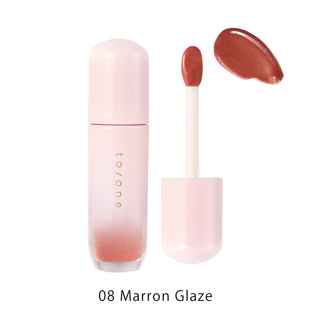 Petal Blooming lip gloss by to/one showcasing vibrant, glossy lips with a smooth, floral-inspired finish