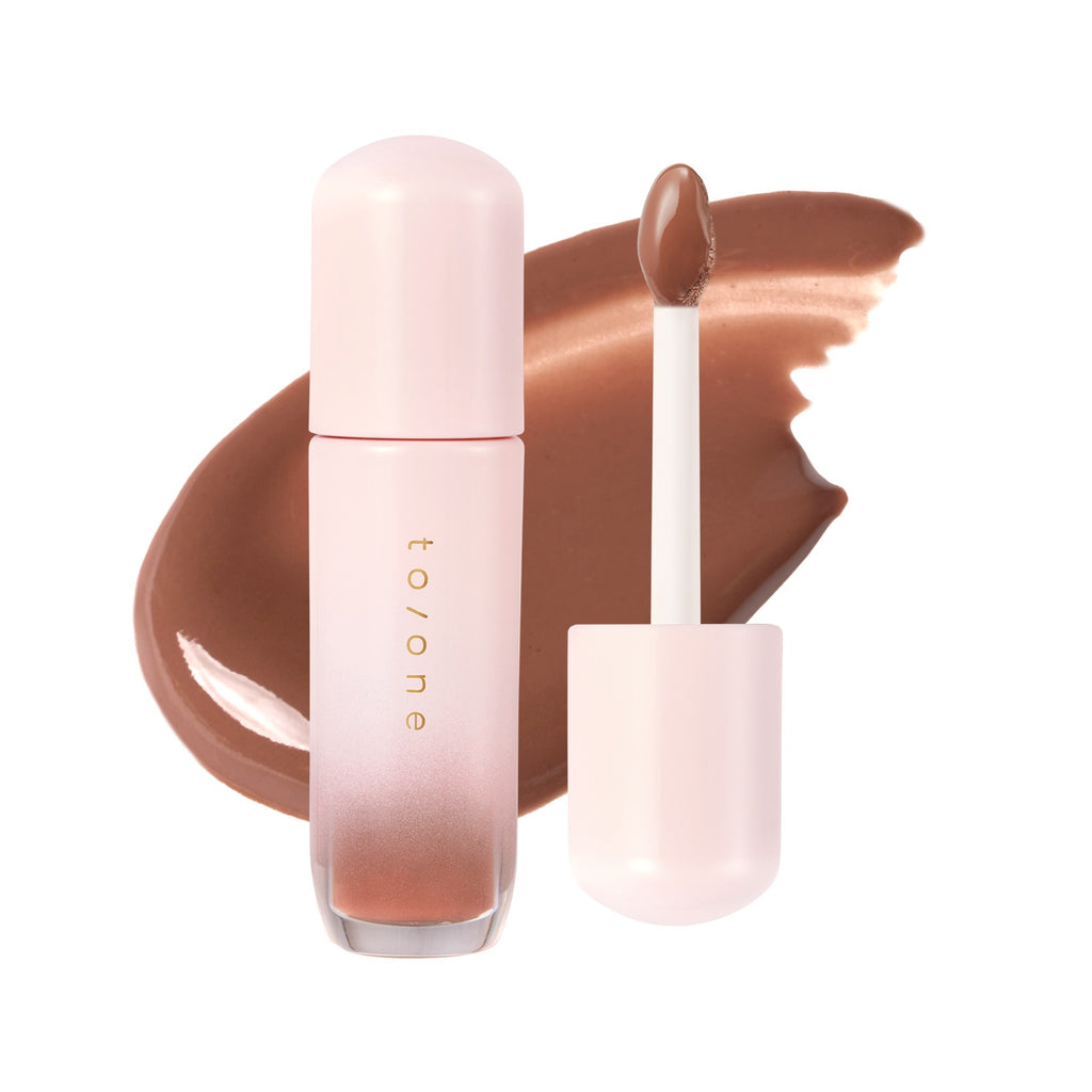 Petal Blooming lip gloss by to/one showcasing vibrant, glossy lips with a smooth, floral-inspired finish